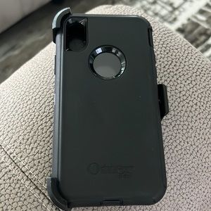 Black iPhone XS OtterBox with clip